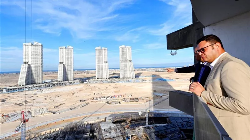 الإسكان تتكشف تطورات تنفيذ أبراج «الداون تاون» وكوبري C19 بمدينة العلمين الجديدة