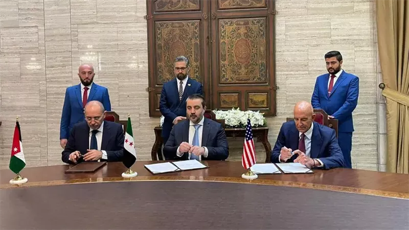 لحظة توقيع الاتفاق