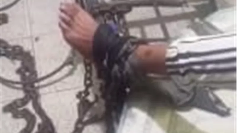  الأمن يكشف تفاصيل تقييد شاب بسلسلة حديدية بالجيزة
