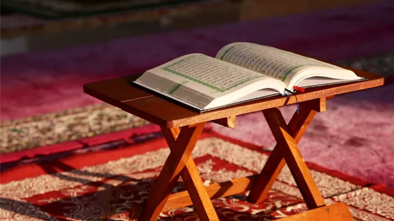 حكم تلحين القرآن وكتابته بالصور التعبيرية.. دار الإفتاء تجيب