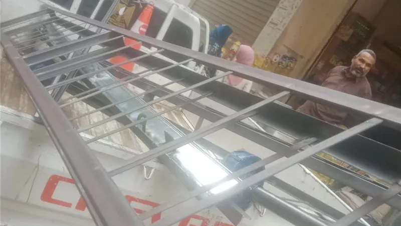 إزالة تعديات خارجة عن محل تجاري بالمنيا والتحفظ على المعدات المخالفة