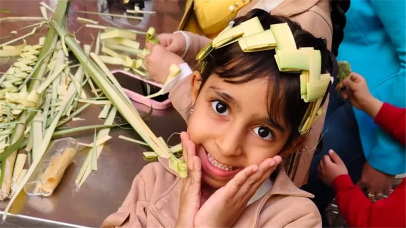 بهجة أحد الشعانين تزين كنيسة الأنبا بيشوي ببورسعيد