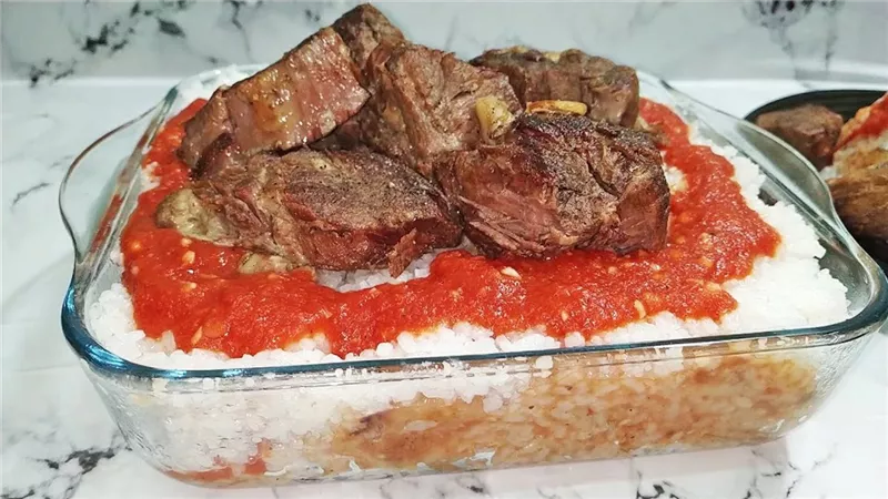 بالخل والثوم.. طريقة تحضير الفتة المصرية